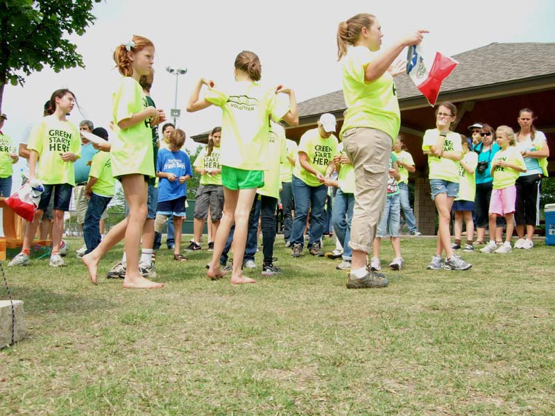 photo of kids and adults participating in clean up